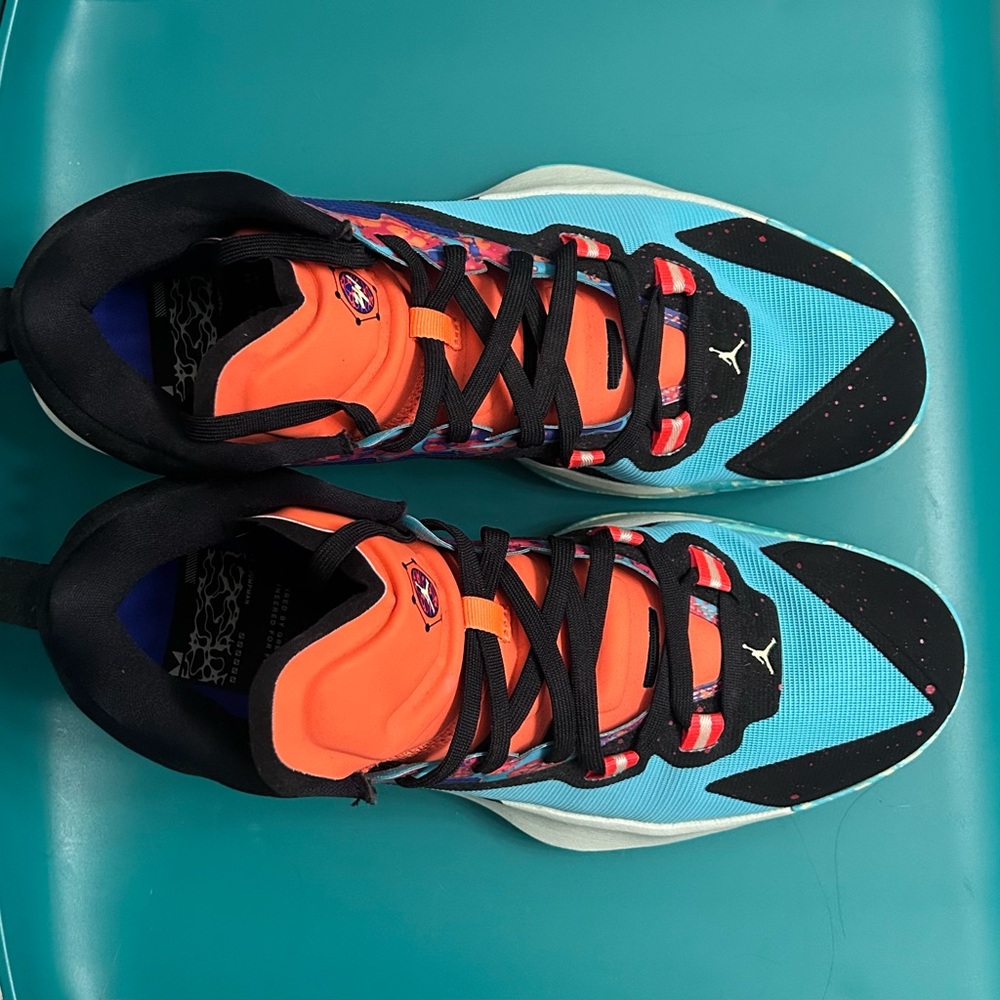 Vibrant Jordan Sneakers with Black and Orange Accents